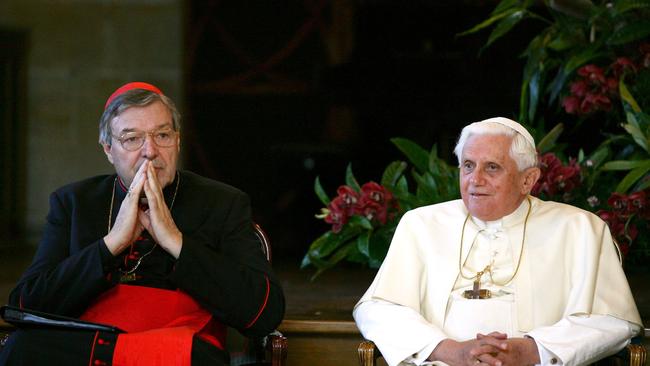 SYDNEY, AUSTRALIA - JULY 18: In this handout photo provided by World Youth Day, (L-R) Catholic Archbishop of Sydney Cardinal George Pell and His Holiness Pope Benedict XVI attend a meeting with Heads of Other Faiths at St Mary's Cathedral Chapter Hall during World Youth Day Sydney 2008 on July 18, 2008 in Sydney, Australia. Organised every two to three years by the Catholic Church, World Youth Day (WYD) is an invitation from the Pope to the youth of the world to celebrate their faith. The celebration, being held in Sydney from July 15, 2008 to July 20, 2008, will mark the first visit of His Holiness Pope Benedict XVI to Australia. (Photo by World Youth Day via Getty Images)