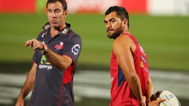 Coach Richard Graham and Karmichael Hunt talk during a Queensland Reds training session at Ballymore on Thursday night.