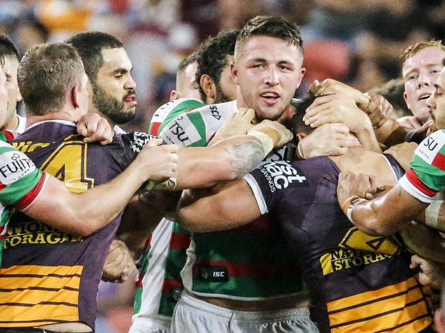 A malay breaks out between the Broncos and Rabbitohs including Sam Burgess of the Rabbitohs during Round 8 of the NRL match between Brisbane Broncos and South Sydney Rabbitohs at Suncorp Stadium,Brisbane, Friday, April 22, 2016. (AAP Image/Glenn Hunt) NO ARCHIVING, EDITORIAL USE ONLY