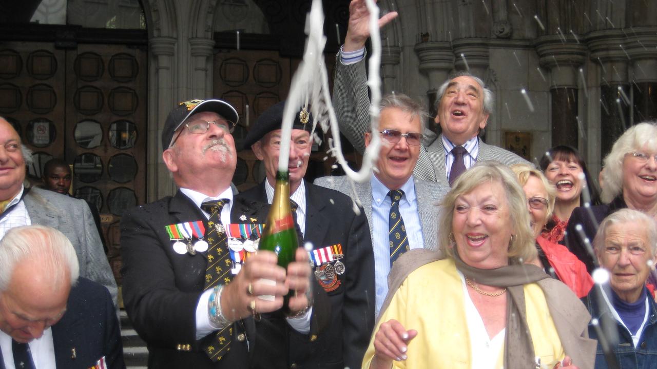 Victims from Maralinga Atomic testing, Tony Roberts, Alan Ilegg and retired Sapper Donald James celebrating on the steps of the High Court in London. Picture: Charles Miranda