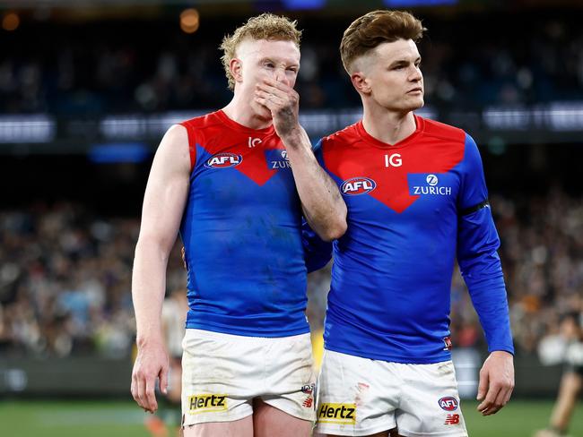 MELBOURNE, AUSTRALIA - SEPTEMBER 07: Clayton Oliver (left) and Bayley Fritsch of the Demons look dejected after a loss during the 2023 AFL First Qualifying Final match between the Collingwood Magpies and the Melbourne Demons at Melbourne Cricket Ground on September 07, 2023 in Melbourne, Australia. (Photo by Michael Willson/AFL Photos via Getty Images)