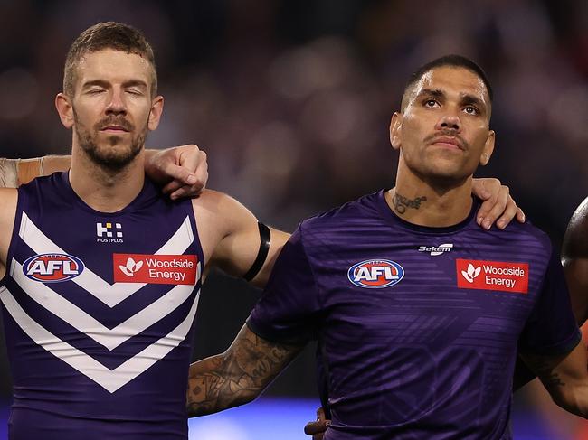 Sam Switkoswki and Michael Walters line up as Fremantle and Sydney paid their respects to former player Cameron McCarthy at Optus Stadium on Friday. Picture: Paul Kane/Getty Images.