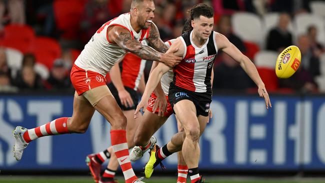 Jack Sinclair, pictured leading Swans superstar Lance Franklin to the ball, has won his first Trevor Barker Medal, to go with his All-Australian selection. Picture: Getty Images