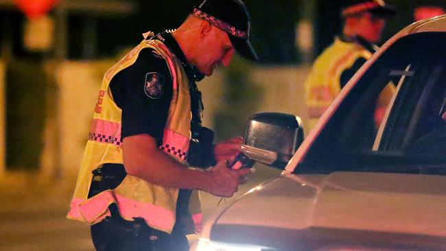 A roadside breath testing operation in action. Picture: Alix Sweeney