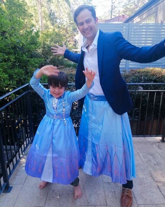 Scott Stuart and his son dressed as Elsa.