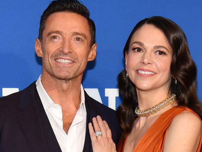 Australian actor Hugh Jackman and US actress Sutton Foster arrive for the opening night of Broadway music-hall "The Music Man" at Winter Garden Theater in New York City on February 10, 2022. (Photo by ANGELA  WEISS / AFP)