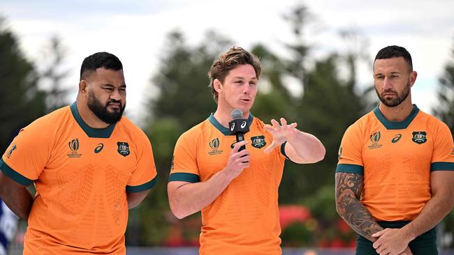 Michael Hooper, centre, and Quade Cooper, right, were surprise omissions from the Wallabies squad Picture: AFP