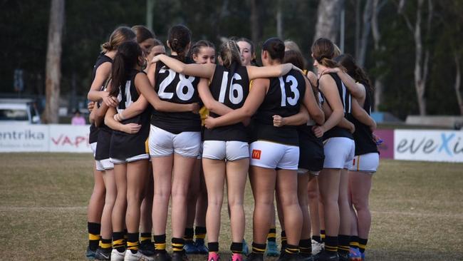 Northern Rivers players huddle last Sunday.