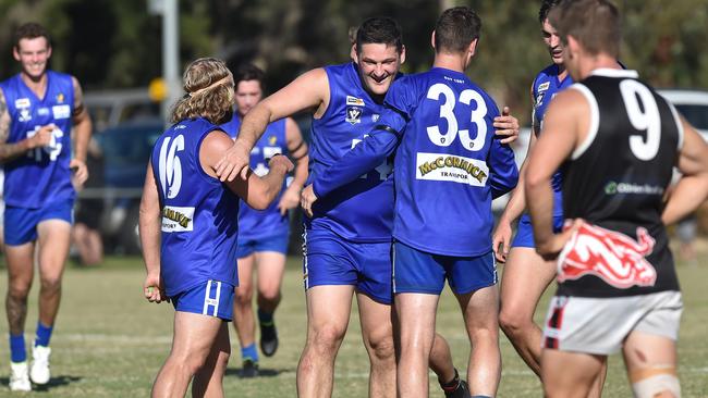 Brendan Fevola with teammates during the MPNFL Div 2 match in Hastings last year.