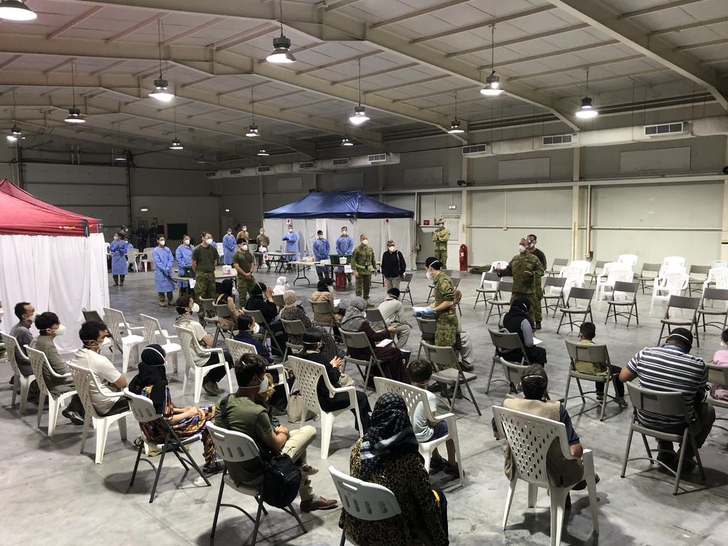 The evacuees will be taken to a temporary evacuation holding centre at Australia’s main operating base in the Middle East for medical support and further screening