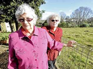 Sisters Edie and Deanne Scobie, residents of Graeme Ave in Goonellabah, are worried about the wildlife coming into their yard since trees were removed from nearby land. Picture: Cathy Adams