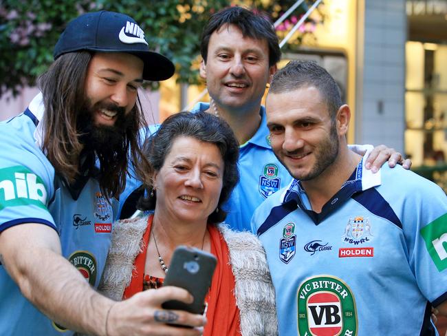 Aaron Woods, Laurie Daley and Robbie Farah with fan Yvonne Kendall at a VB Blues promotion. Picture: Mark Evans