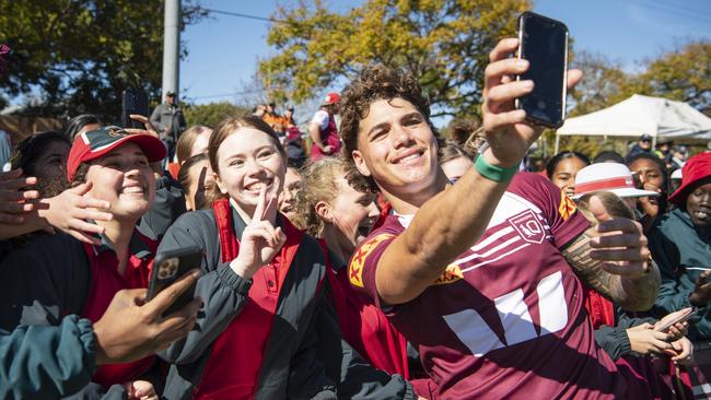 Norma Mullins (centre) has her photo taken with Reece Walsh on Queensland Maroons fan day at Toowoomba Sports Ground. Pictures: Kevin Farmer