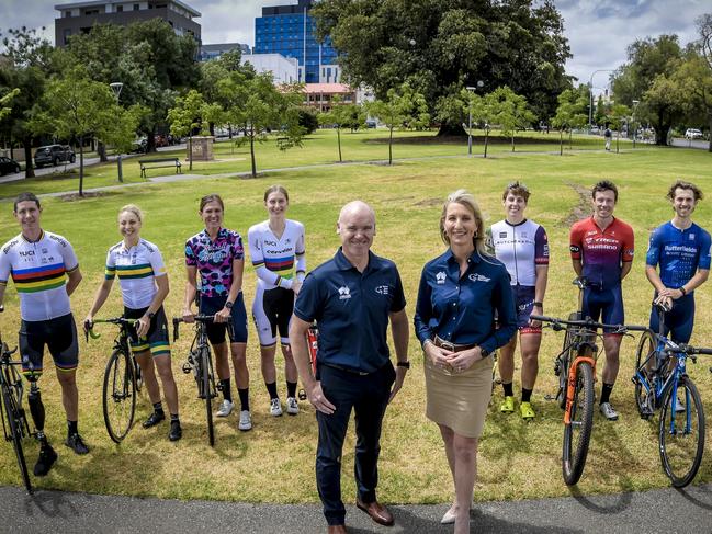 NO ARCHIVING . ONE TIME USE ONLY .  Men's and women's race directors Stuart O'Grady and Kimberley Conte at the announcement of the Santos Festival of Cycling. Front Middle - Stuart O'Grady (Race Director, Men's); Kimberly Conte (Race Director, Women's)L-R Behind-Darren Hicks (Para-Cycling); Meg Lemon (Para-Cycling); Carlee Taylor (NRS Road); Ella Sibley (Track); Nat Redmond (Cyclo-Cross); Cam Ivory (MTB Cross-Country);  Tristan Sauders (NRS Road); Dontay Cooper (BMX). Picture: Roy Van der Vegt /Santos Festival of Cycling