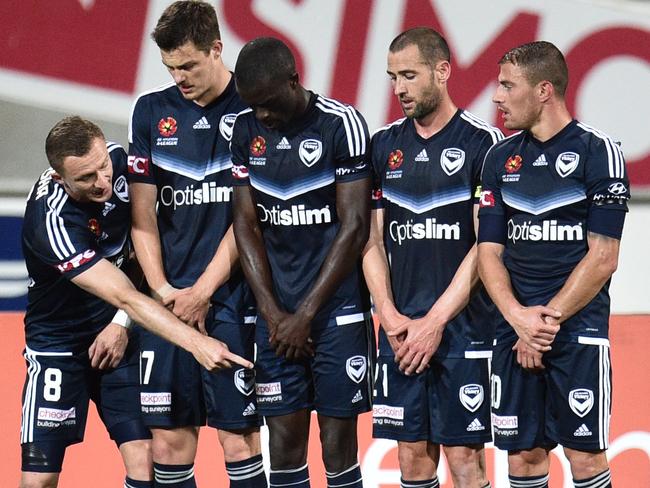 Besart Berisha lines up the troops to defend a free kick. Picture: AAP