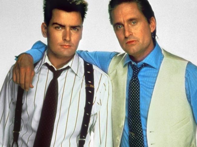 Actors Charlie Sheen (L) and Michael Douglas in 1987 film 'Wall Street'.