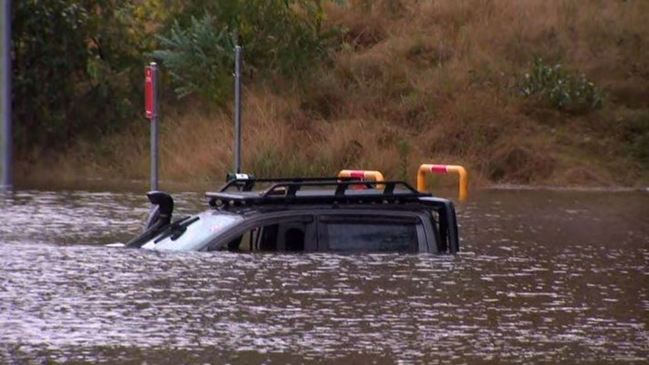 Sydney floods: Police rescue, Man trapped ute, South Windsor | news.com ...