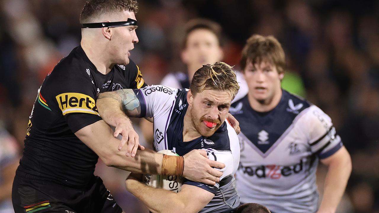 Cameron Munster is wrapped up by Liam Martin. Picture: Cameron Spencer/Getty Images