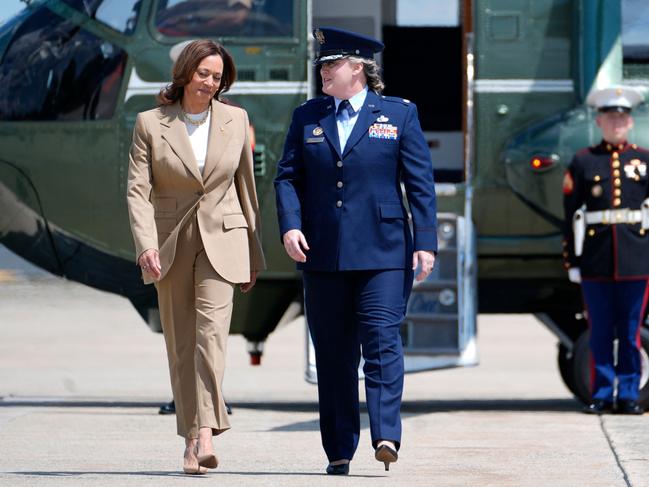 US Vice President and Democratic presidential candidate Kamala Harris (L) arrives to board Air Force Two at Joint Base Andrews in Maryland on July 27, 2024. Harris is traveling to Pittsfield, Massachusetts, for a campaign fundraising event. (Photo by Stephanie Scarbrough / POOL / AFP)