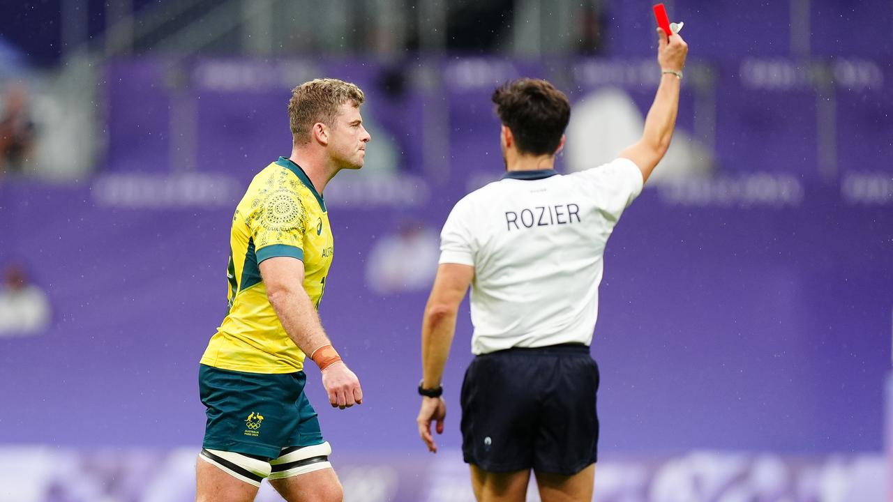 Australia's Nick Malouf (left) is shown a red card by referee Jeremy Rozier during the rugby sevens Bronze Medal match against South Africa at the Stade de France on the first day of the 2024 Paris Olympic Games in France. Picture date: Saturday July 27, 2024. (Photo by Mike Egerton/PA Images via Getty Images)