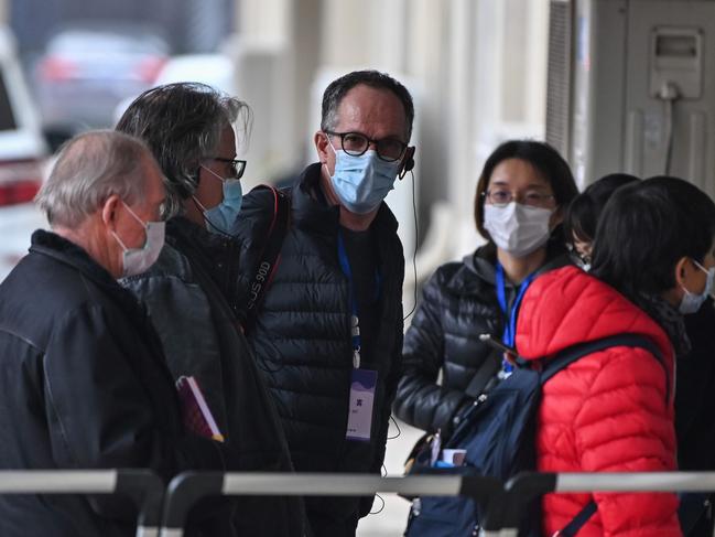 Peter Ben Embarek (C) and other members of the WHO team investigating the origins of coronavirus, visit a local community in Wuhan. Picture: AFP