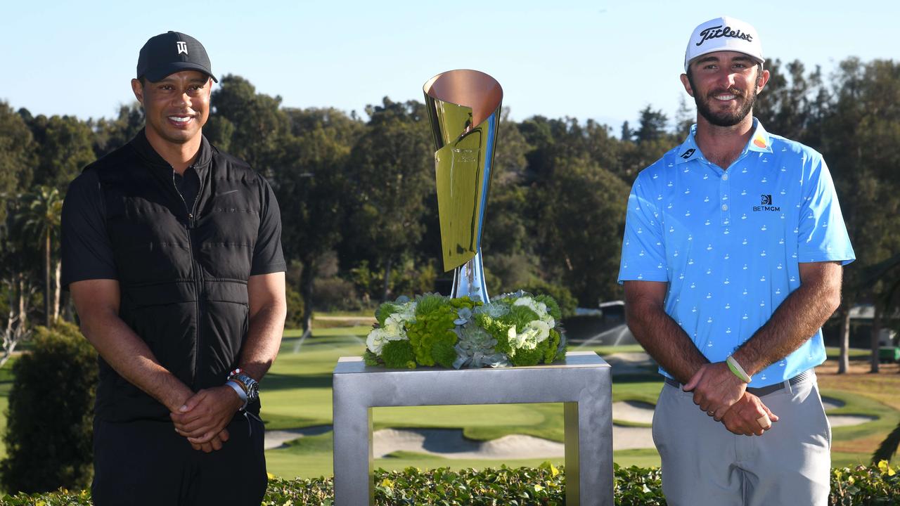 Tiger Woods presented Max Homa with the The Genesis Invitational trophy on Sunday. Picture: Harry How/Getty Images/AFP