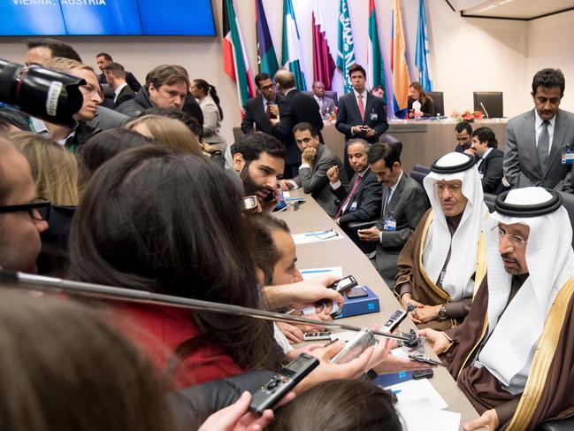 Saudi Arabia’s energy minister Khalid al-Falih (bottom right) attends a meeting of the Organization of the Petroleum Exporting Countries, OPEC, at the OPEC headquarters in Vienna, Austria on November 30, 2016. OPEC sought to defy expectations and finalise a deal reducing its oil output for the first time in eight years, in an effort to boost painfully low crude prices. / AFP PHOTO / JOE KLAMAR