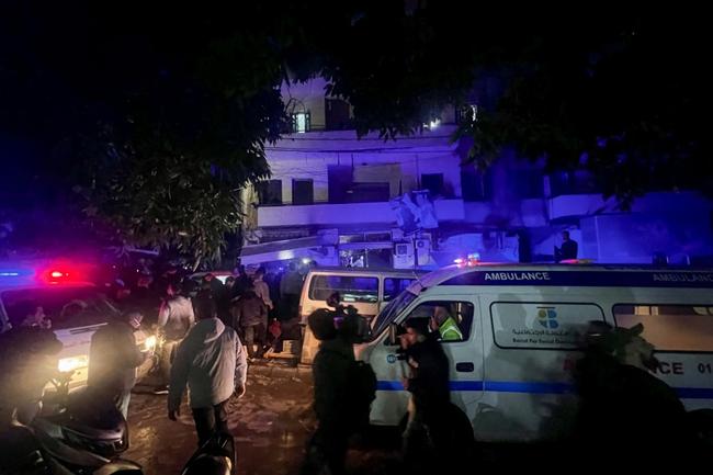 Ambulances and police at the scene of an Israeli strike that targeted Zuqaq al-Blat neighbourhood in Beirut, killing five people according to Lebanon's health ministry