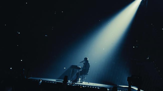 Billie Eilish at the keyboard in Brisbane. Picture: Henry Wu