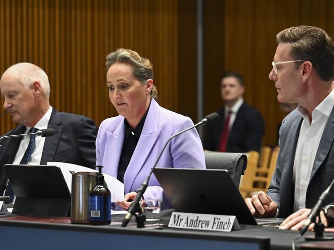 Richard Goyder, left, with Qantas chief executive Vanessa Hudson and the airline’s General Counsel Andrew Finch at a Senate inquiry in Parliament House. Picture: NCA NewsWire / Martin Ollman