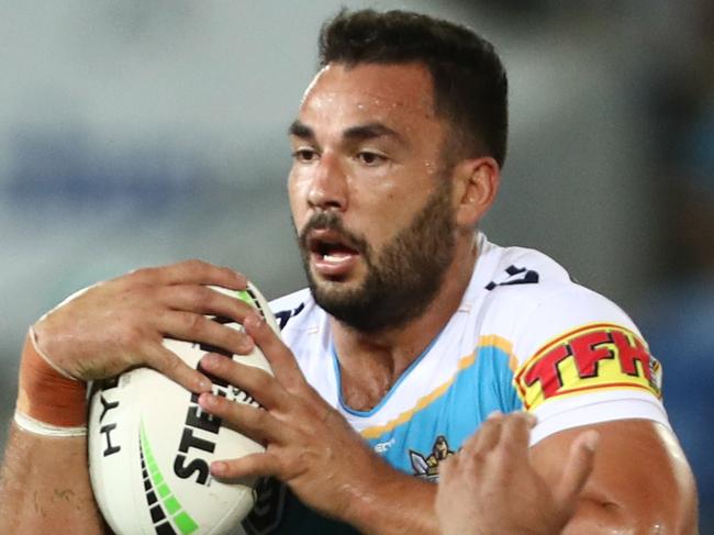 GOLD COAST, AUSTRALIA - APRIL 12: Ryan James of the Titans is tackled during the round five NRL match between the Gold Coast Titans and the Penrith Panthers at Cbus Super Stadium on April 12, 2019 in Gold Coast, Australia. (Photo by Chris Hyde/Getty Images)