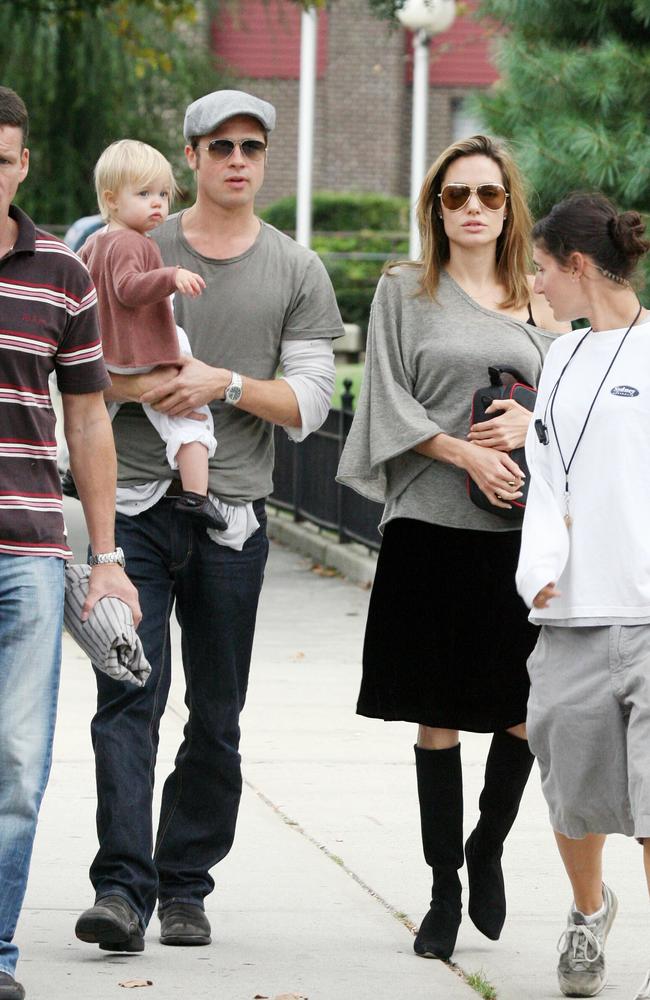 Angelina Jolie and Brad Pitt walk with baby Shiloh on the way to Brad’s trailer while he is filming his movie Burn After Reading on October 10, 2007 in New York City. Picture: Splash