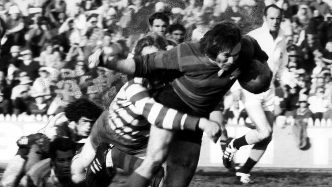 Rabbitohs' centre Bob Honan tries to break tackle during Souths v Canterbury at Redfern Oval, 17/06/72. Picture: News Corp. Rugby League A/CT Historical