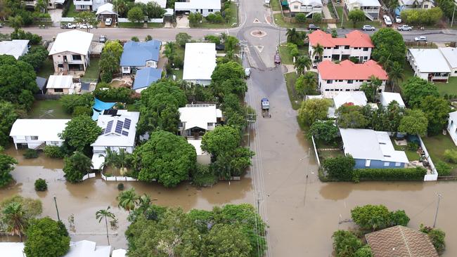 Houses inundated with flood waters are seen in Townsville. 