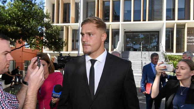 St. George Illawarra Dragons player Jack de Belin (centre) leaves Wollongong Local Court in Wollongong, Tuesday, February 12, 2019. (AAP Image/Dean Lewins) NO ARCHIVING. Picture: DEAN LEWINS