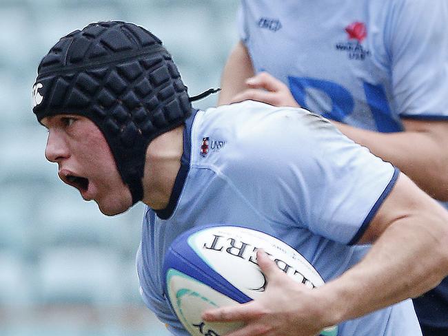 Waratahs' Brendan Palmer with the ball. Under 19s Waratahs  v Melbourne Rebels in Super Rugby National Championships Round 1 at Leichhardt Oval. Picture: John Appleyard.