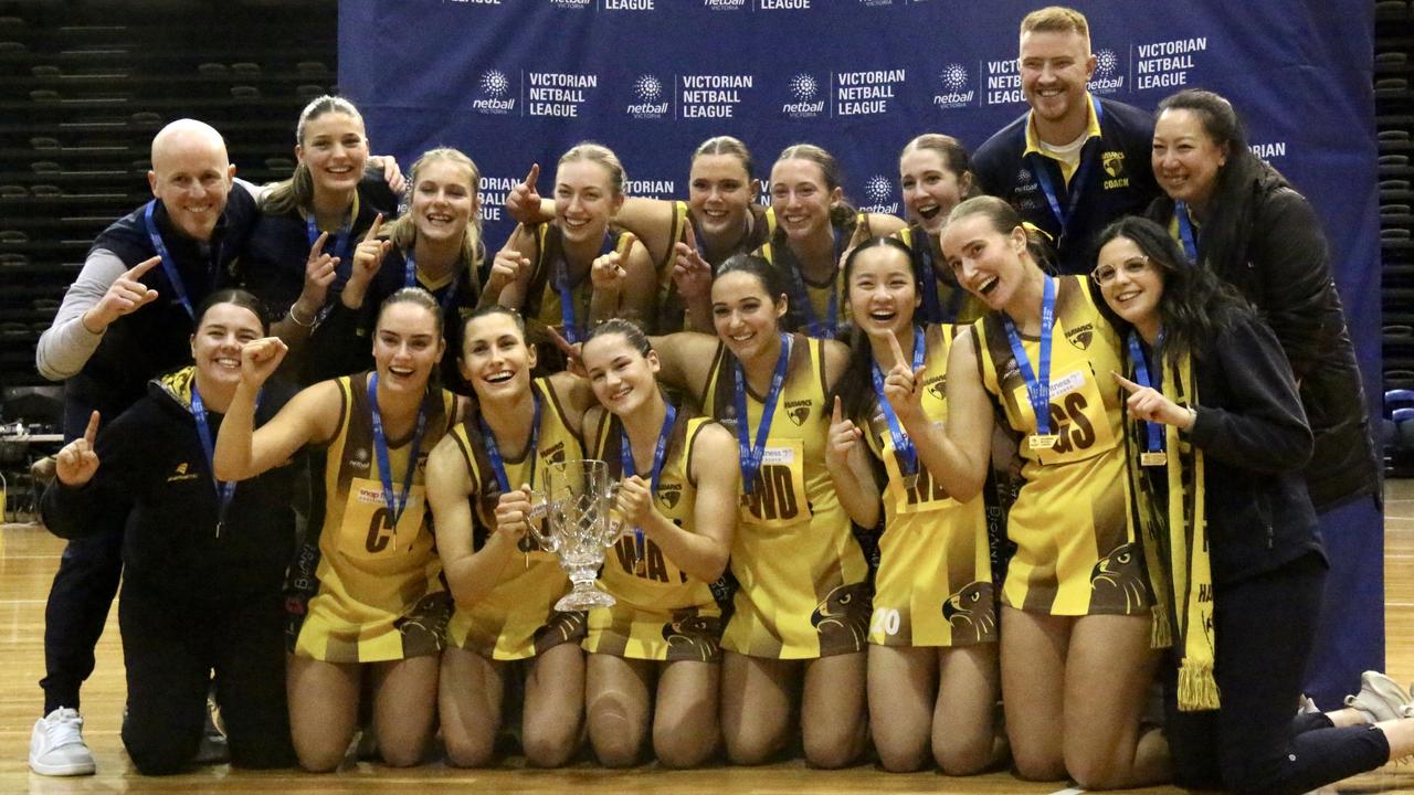 A night to remember: Hawks Netball squad with their winning medallions. Picture: Meg Saultry