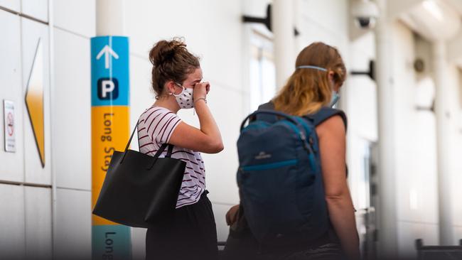 Passengers at Melbourne Airport’s Terminal 4, where a cafe worker tested positive. Photograph: Che Chorley