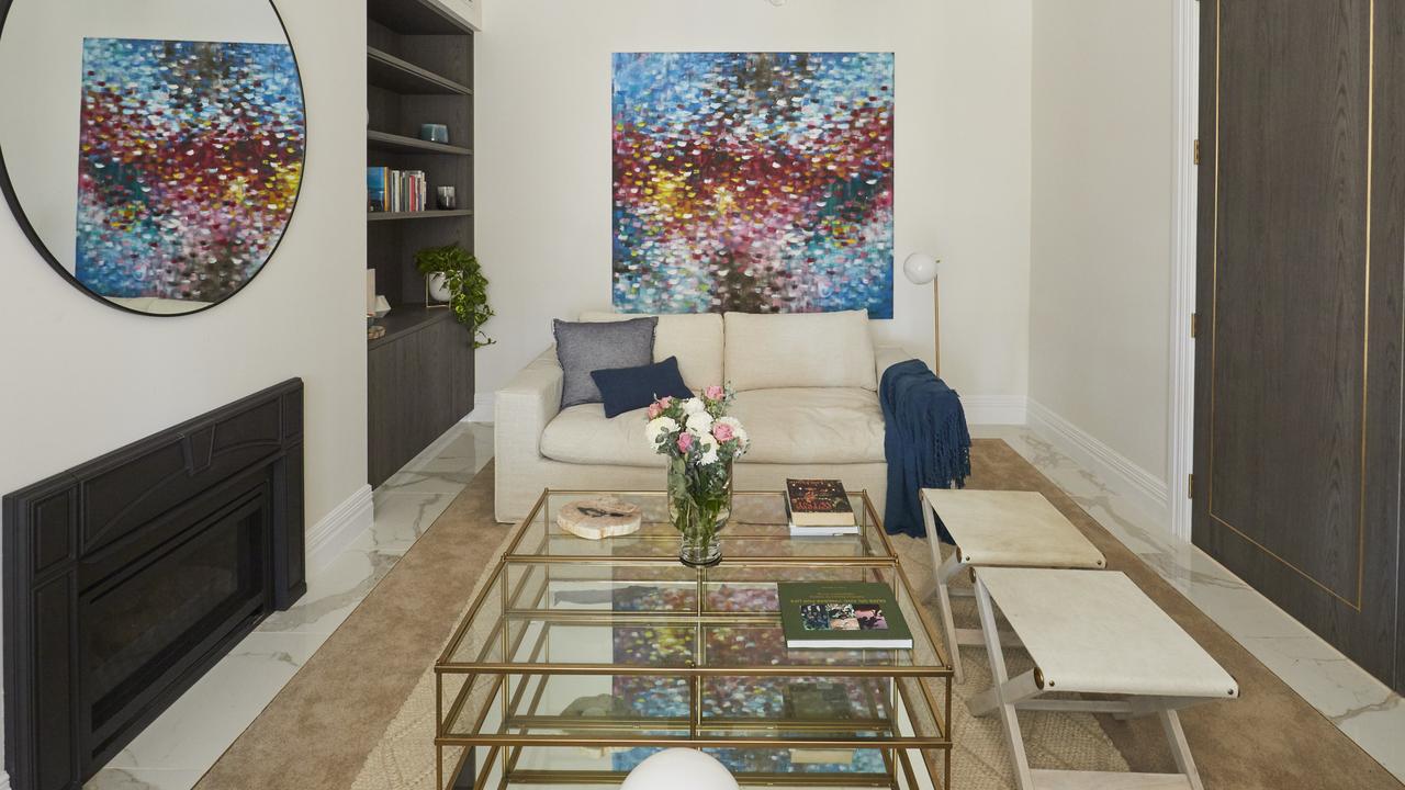 Shaynna ‘hated’ the perimeter of tiles around Jesse and Mel’s formal lounge room, prompting Jesse to accuse her of not having ‘expensive’ taste. Picture: The Block