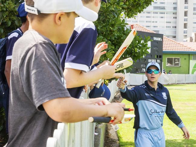 Kids clamour for Steve Smith’s autograph. Picture: Jenny Evans