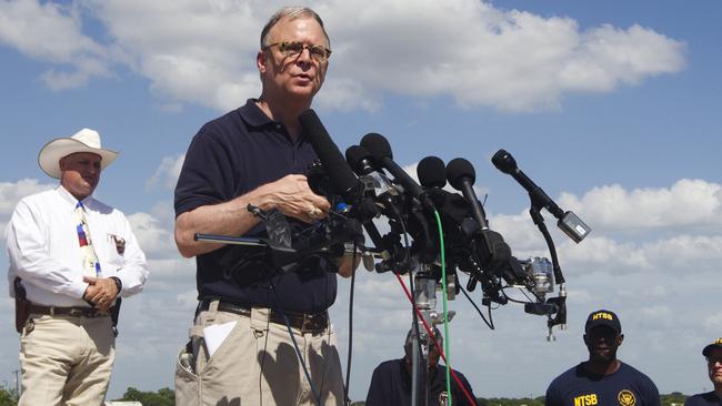 NTSB member, Robert Sumwalt speaks at a press conference at the site of Saturday's hot air balloon crash near Lockhart, Texas.