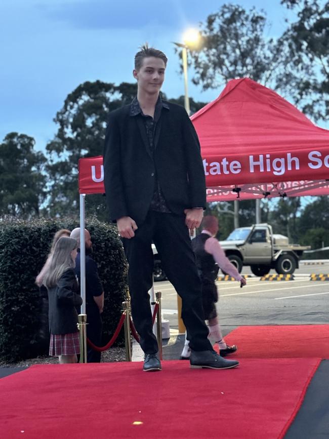 The students of Urangan State High School arriving at their formal.