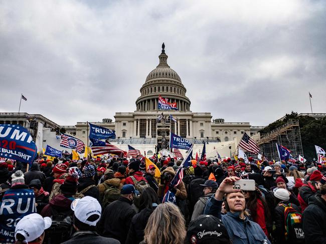 Pro-Trump supporters storm the US Capitol following a rally with President Donald Trump on January 6, 2021. Picture: AFP