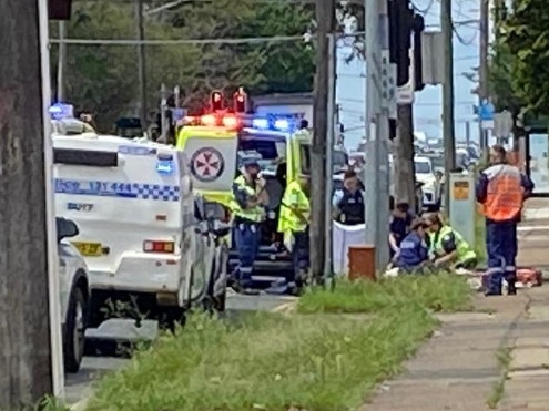 Emergency crews work on the cyclist. Picture: Supplied