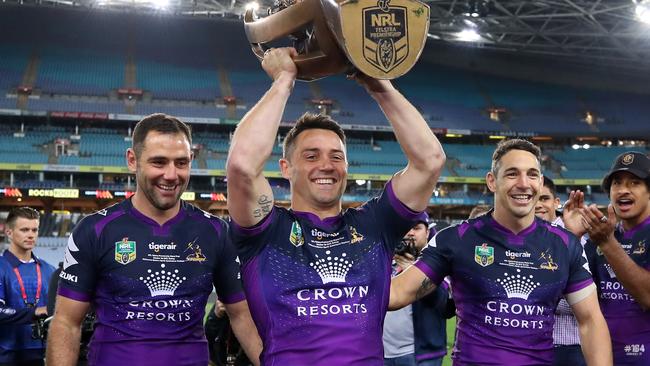 Cameron Smith walks off with Cooper Cronk and Billy Slater after the 2017 grand final, the last time the trio played together Picture: Getty Images