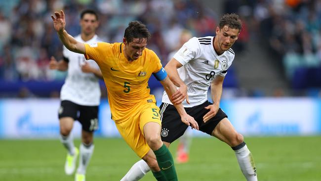 Mark Milligan of Australia and Leon Goretzka of Germany battle for possession during the FIFA Confederations Cup.
