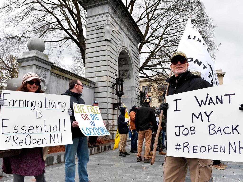 Hundreds of New Hampshire residents rally at the State House, calling on the government to re-open the state for business as the coronavirus shutdown continues. Picture: Joseph Prezioso/AFP