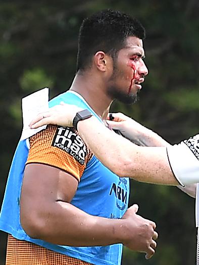 Payne Haas gets checked out by a trainer. Picture: John Gass