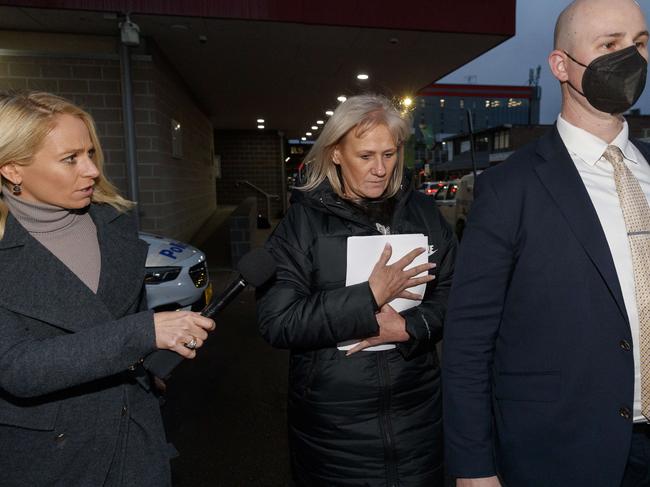 Jeanette Jeske mother of alleged Alameddine clan associate Trent Jeske leaves Fairfield Police Station on Wednesday evening. She is pictured with one of her sons (right). Picture: David Swift