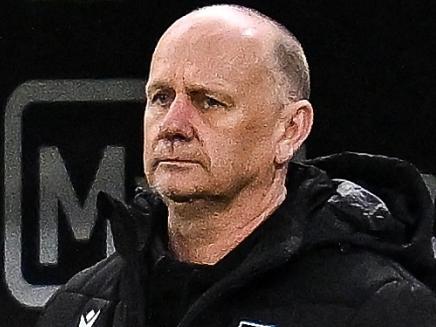 PERTH, AUSTRALIA - MAY 24: Ken Hinkley, Senior Coach of the Power coaches from the bench during the 2025 AFL Round 11 match between Walyalup (Fremantle Dockers) and Yartapuulti (Port Adelaide Power) at Optus Stadium on May 24, 2025 in Perth, Australia. (Photo by Daniel Carson/AFL Photos via Getty Images)